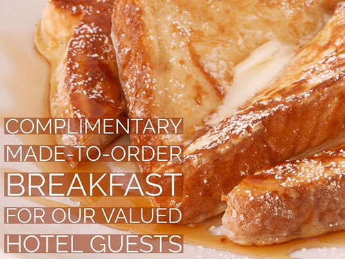 Complimentary-Breakfast-Red-Coach-Inn photo of french toast with text overlay saying Complimentary Made-to-Order Breakfast for Our Valued Hotel Guests