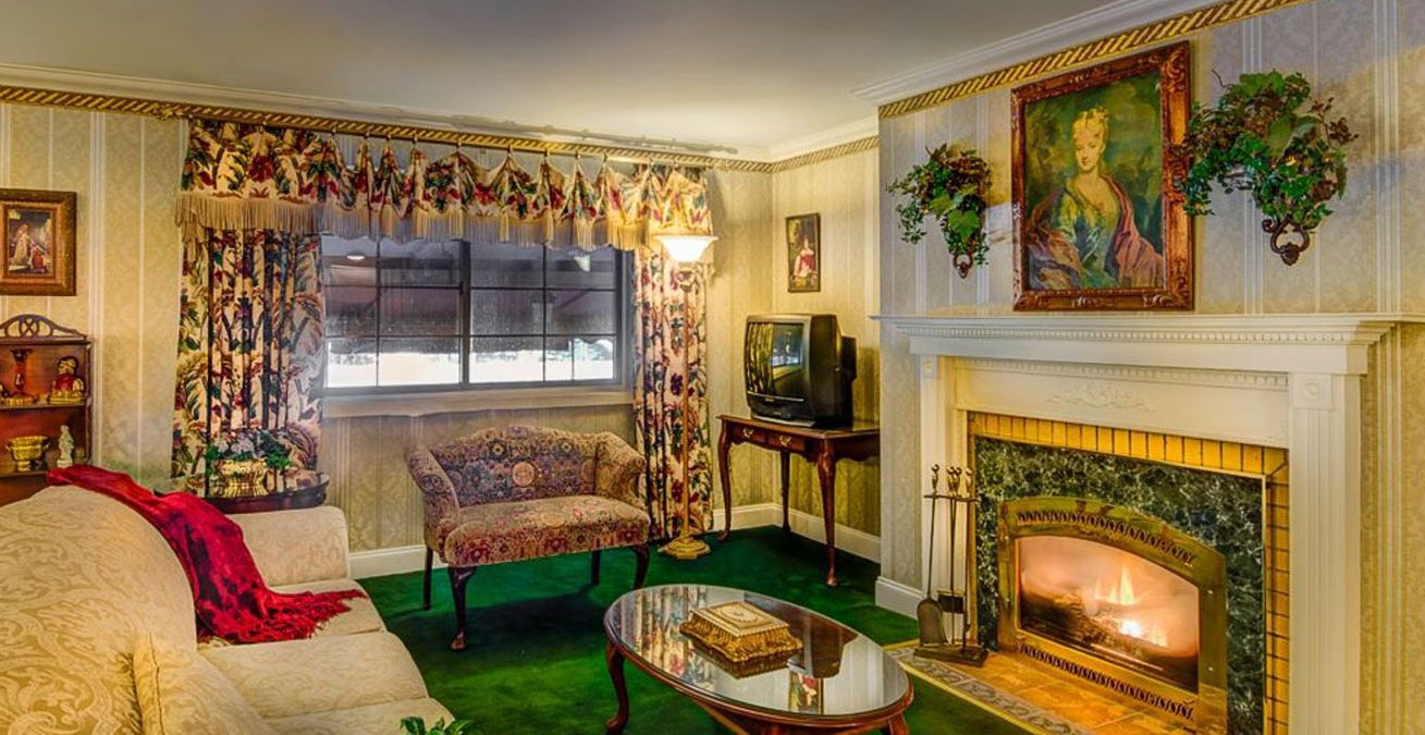 Guest room living area with fireplace